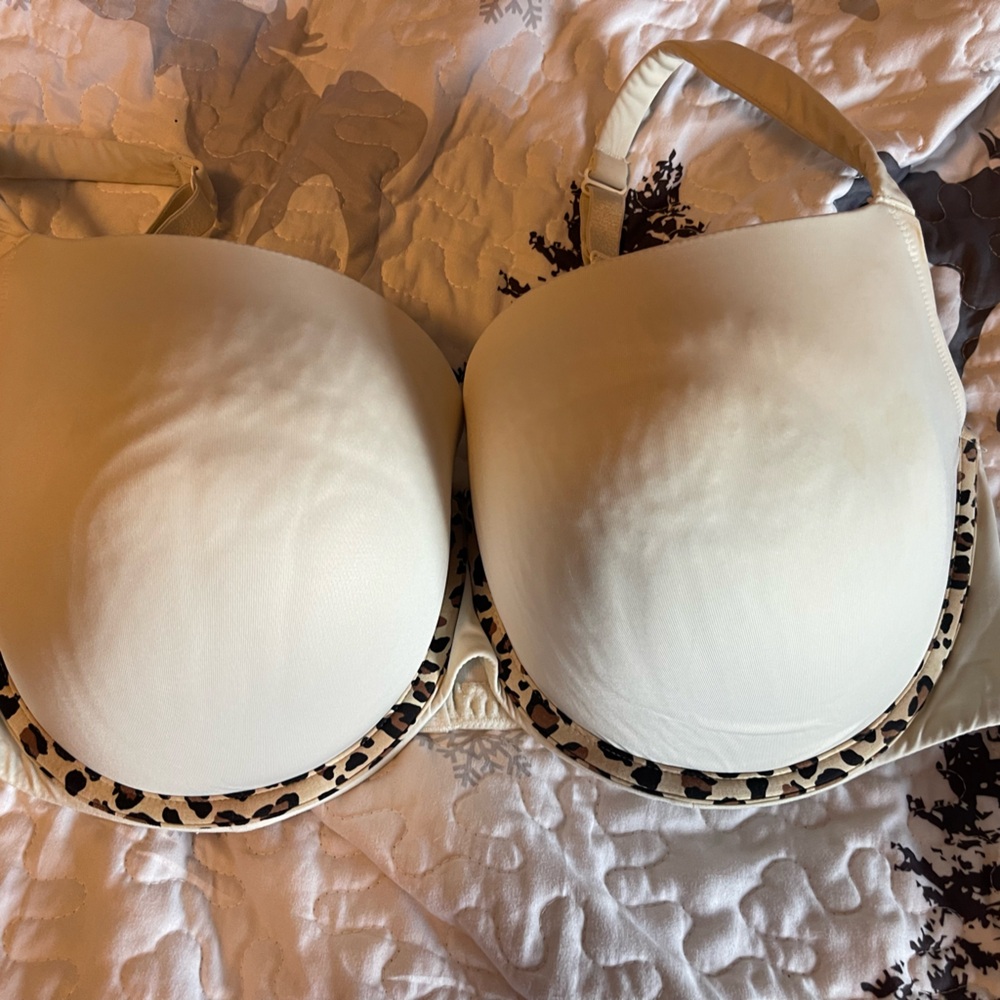 Leopard Trim Cream Bra. Does have a spot on the front- shown in picture.